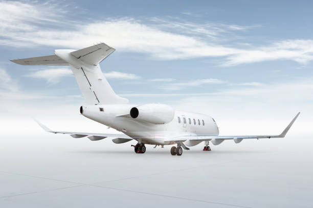 istock White luxury executive airliner isolated on bright background with sky 1665790804