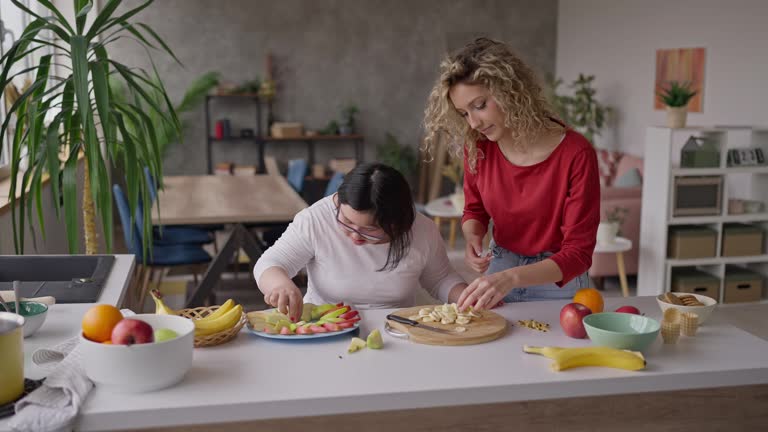 Friends making a fruit salad