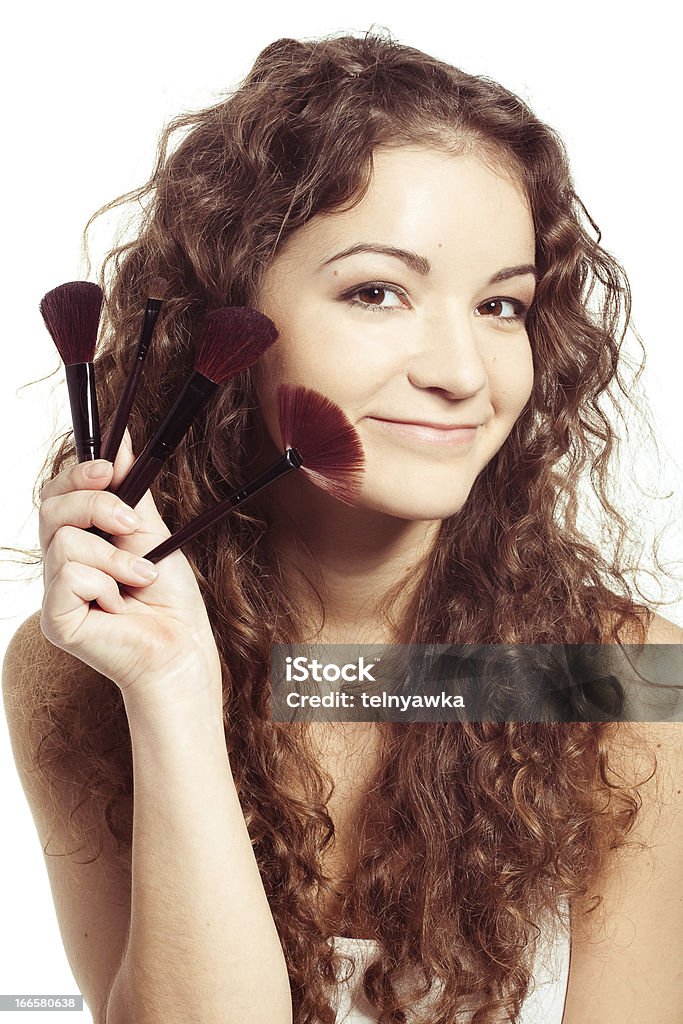 Sonriente mujer con maquillaje herramientas - Foto de stock de Adulto libre de derechos