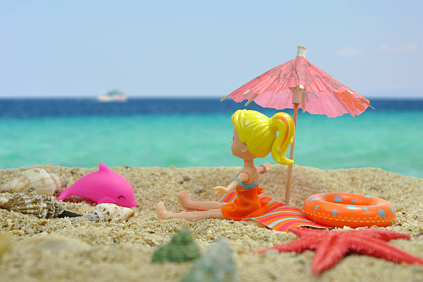 Summer scene #20 - Girl under the sun umbrella on the beach