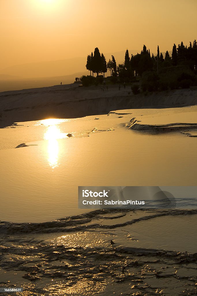 Pamukkale natural pools at dusk Pamukkale natural pools at dusk, Turkey. Asia Stock Photo