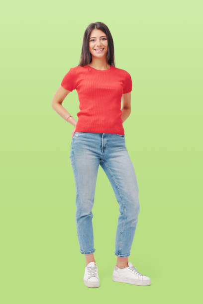 istock Cute young woman smiling and posing 1665846038