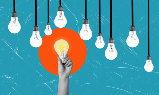 istock Creativity and New Ideas in Business. Artistic Collage. A hand with a glowing light bulb 1665848188
