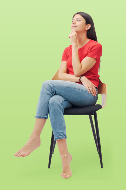 istock Young woman sitting and thinking 1665851509