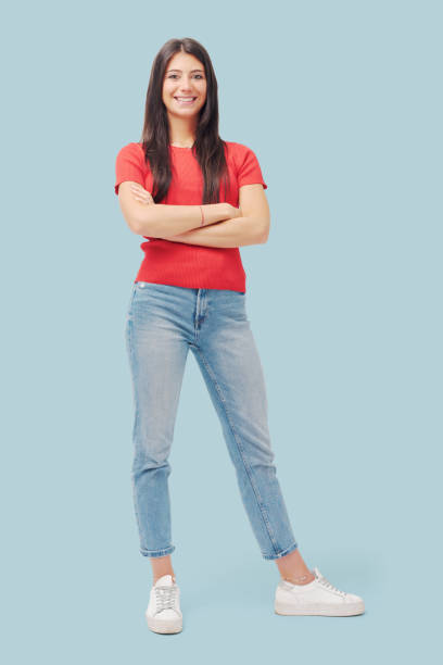 istock Cute young woman smiling and posing 1665861349