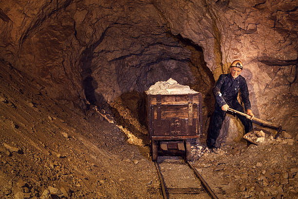 Mine Worker Exhibited miner figure deep underground in a lead mine. (Mine Mezica, Slovenia) coal mine photos stock pictures, royalty-free photos & images