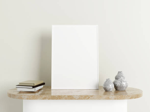 istock Minimalist vertical white poster or photo frame mockup on the marble table with decoration. 3d rendering. 1665871474