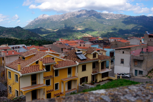 Views of the roofs of Orgosolo municipality with the mountains in background