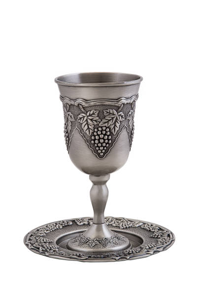 istock Silver kiddush wine cup and saucer isolated 1665875807