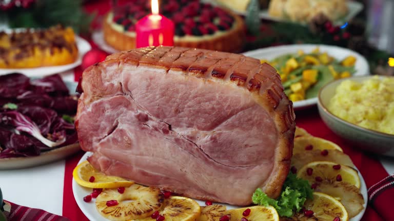 Christmas Dinner with Baked Glazed Ham and Various Vegetables