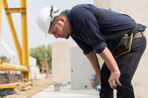 istock Foreman construction builder tired and thirst of water at construction site 1665905045