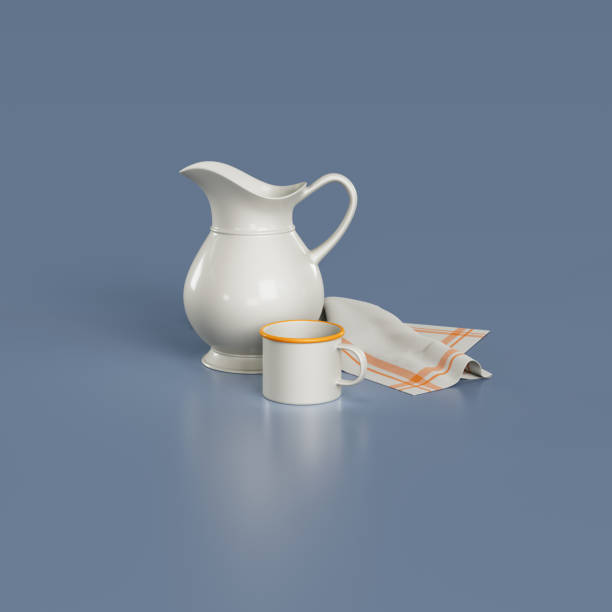 istock White jug and mug with cloth 1665923260