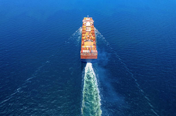 istock Aerial top view container ship full load container for logistics import export, shipping or transportation concept background. shipyard at sunrise, logistic import export and transport industry background 1665923284