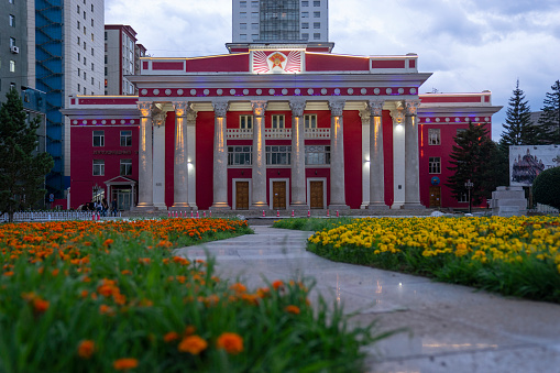 Ulaanbaatar, Mongolia - July 21, 2023: The Mongolian Grand Theatre of National Arts at dusk.