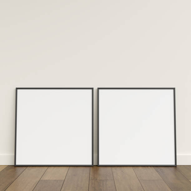 istock Empty picture frame on wooden floor leaning against wall. Blank poster frame standing on wooden floor. Blank poster frame mockup. Empty picture frame mockup. 3d rendering. 1665955339