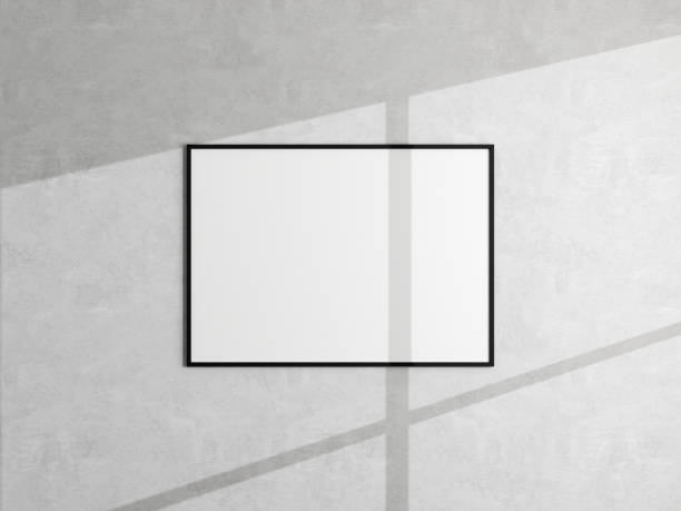 istock Minimal poster picture frame mockup hanging on white wall. Blank frame mockup. Clean, modern, minimal frame. 3d rendering. 1665955928