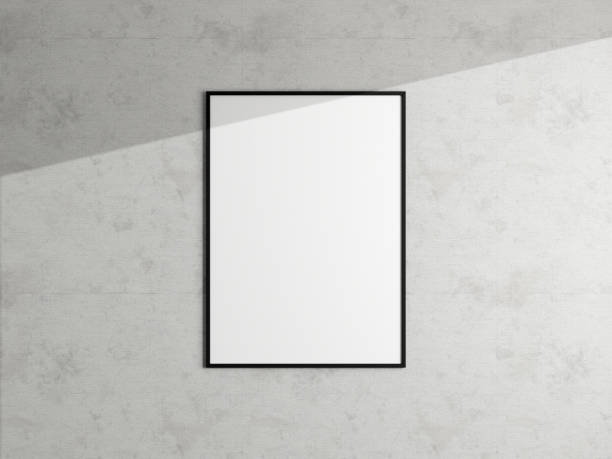 istock Minimal poster picture frame mockup hanging on the white wall. Blank frame mockup. Clean, modern, minimal frame. 3d rendering. 1665956482