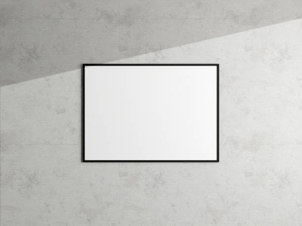 istock Minimal poster picture frame mockup hanging on the white wall. Blank frame mockup. Clean, modern, minimal frame. 3d rendering. 1665956487