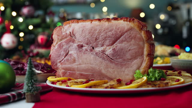 Christmas Dinner with Baked Glazed Ham and Various Vegetables