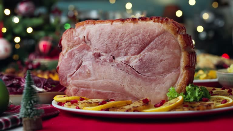 Christmas Dinner with Baked Glazed Ham and Various Vegetables