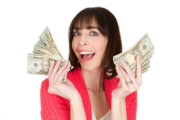 istock woman with cash 166597499