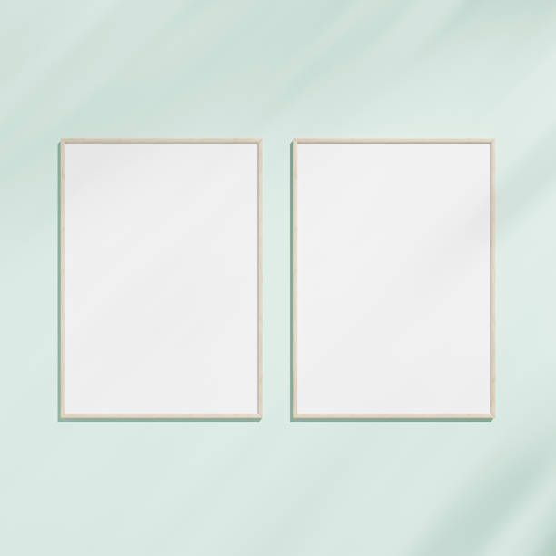 istock frame mockup on clean wall. Poster mockup. Clean, modern, minimal frame. Hanging photo mockup. 1665983675