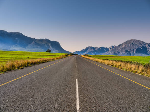 istock Winding road through beautiful valley and mountain, Mitchell's Pass, Ceres, Western Cape, South Africa 1665993476