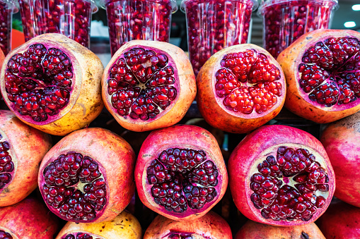 Pomegranates at a juice stand at Carmel Market in Tel Aviv, Israel.