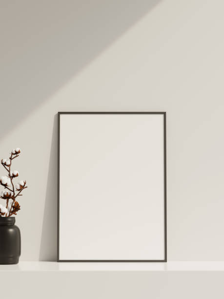 istock Empty poster frame mockup in sunlight with shadow and vase 1666013539