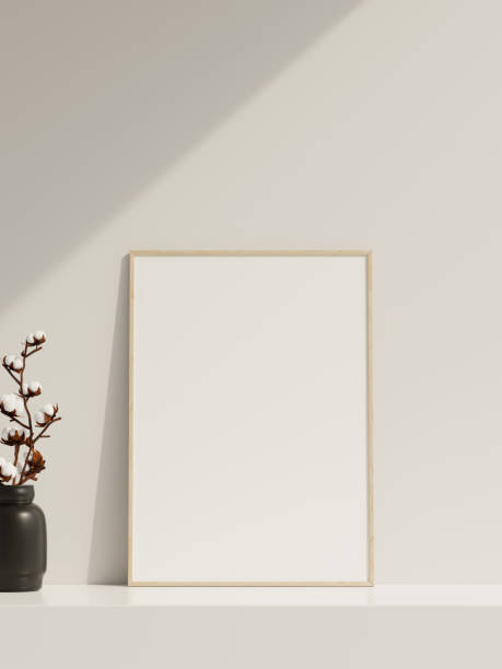 istock Empty poster frame mockup in sunlight with shadow and vase 1666013542