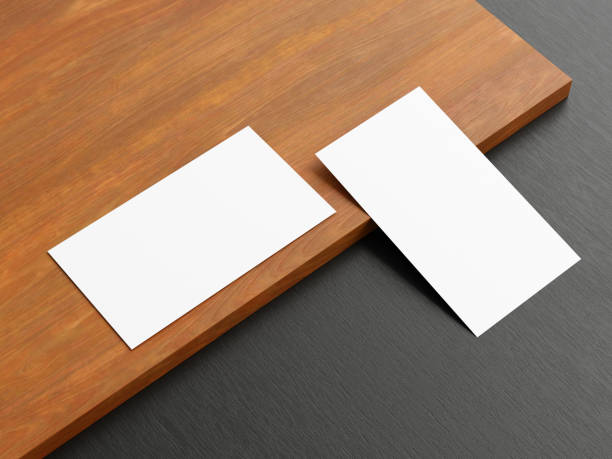 istock Clean minimal business card mockup on wood background 1666020516
