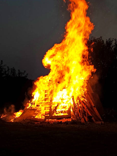 istock Huge Bonfire in the country at dusk 1666022815