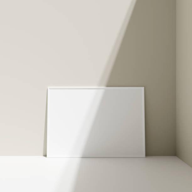 istock Poster photo frame mockup leanings against the pastel wall on the floor with shadow 1666022821