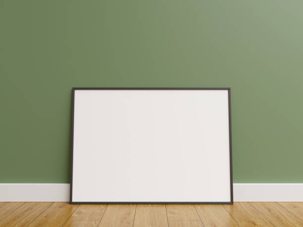 istock Frame mock up. frame poster on wooden floor with green wall. 1666034870