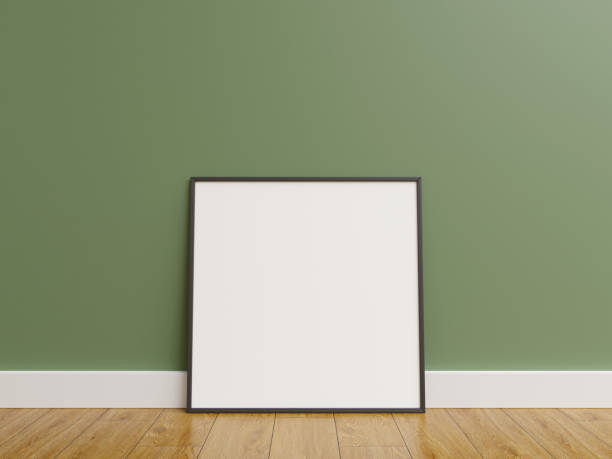 istock Frame mock up. frame poster on wooden floor with green wall. 1666034874