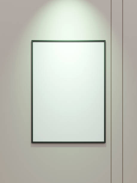 istock Minimal black vertical picture poster frame mockup on white wallpaper with spotlight 1666043256