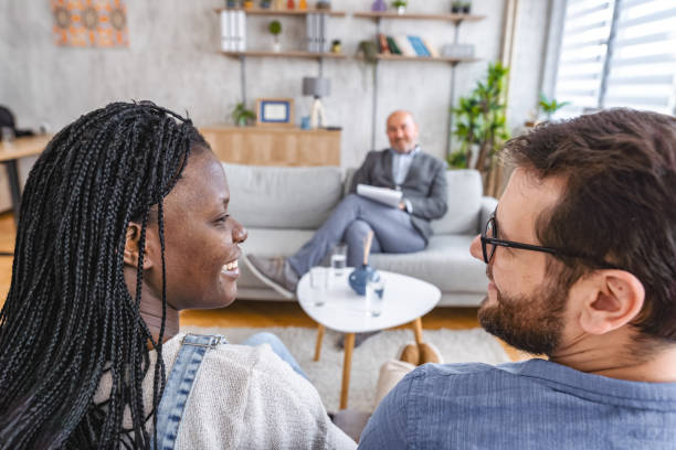 istock Married couple talking with marriage counselor about their relationship 1666054546