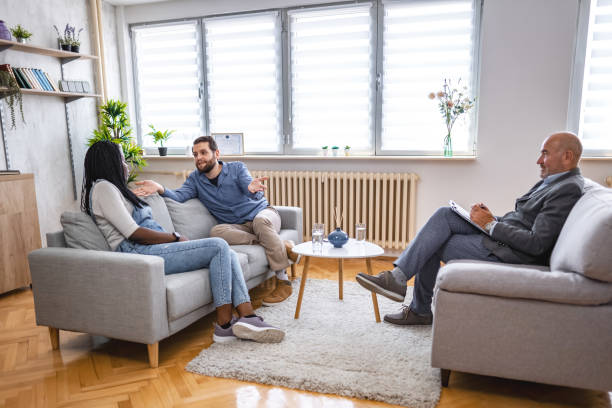 istock Married couple talking about their relationship with marriage counselor 1666054817
