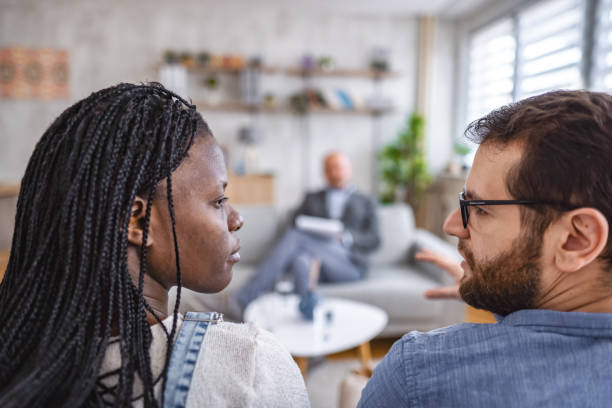 istock Married couple talking with marriage counselor about their relationship 1666055408