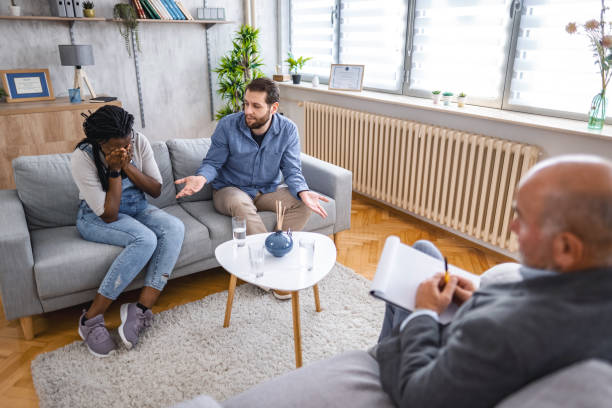 istock Married couple talking about their relationship with marriage counselor 1666055950