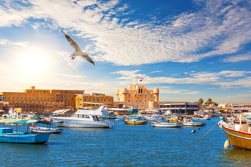 Beautiful view of the harbour and the Citadel of Qaitbay, the place of famous Lighthouse, Alexandria, Egypt.