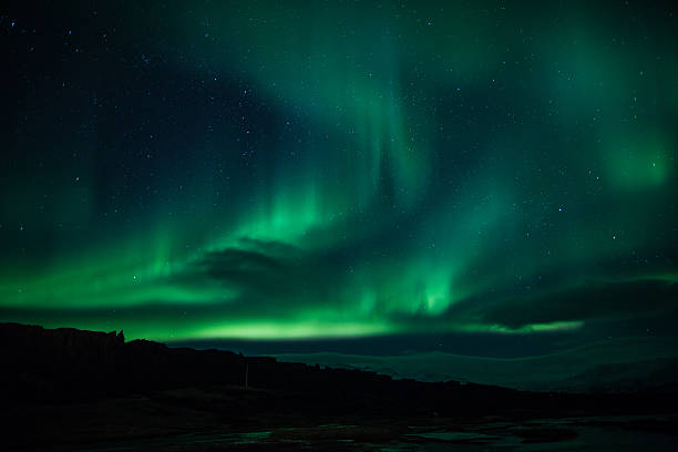 istock Northern lights (Aurora borealis) Over Iceland 166608060