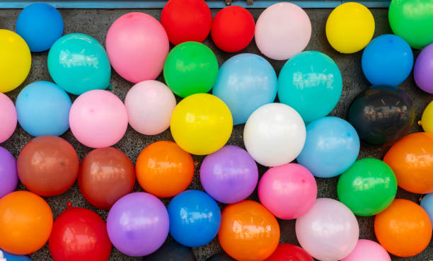 istock Colourful balloons on a wall for game 1666091150