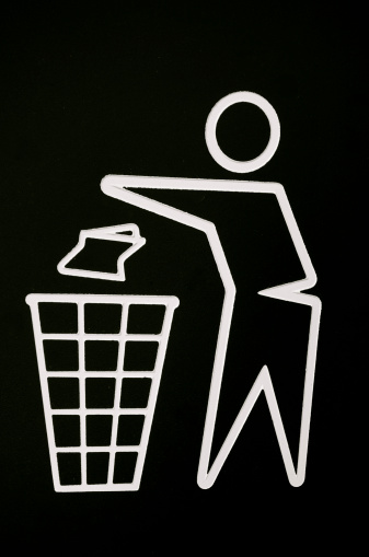 No littering sign - Throwing in the bin