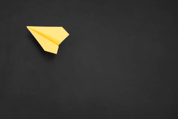 istock Yellow Paper Airplane 1666103888