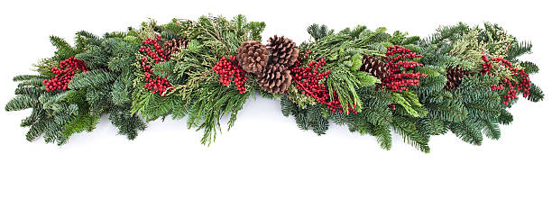 A picture of a garland with red and green leaves stock photo