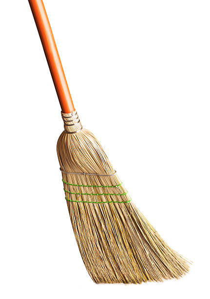 Traditional broom on a white background stock photo