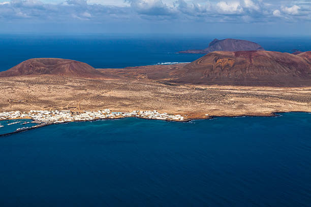 istock view to La Graciosa  - volcanic island, Canary 166611109