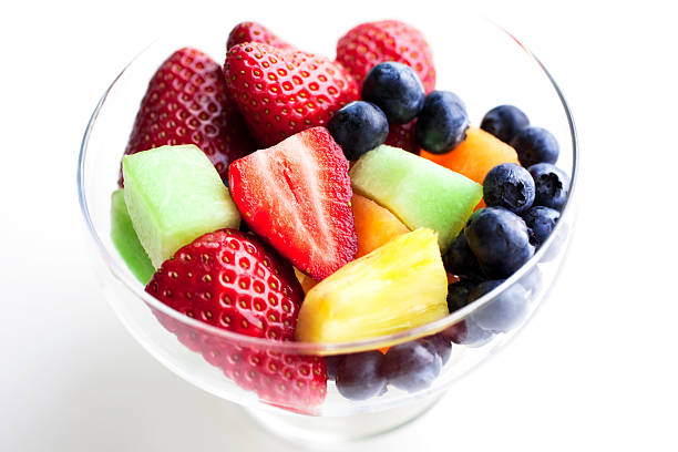 istock A bowl of fresh fruit salad on a white background 166611986