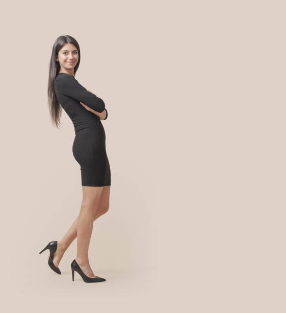 istock Beautiful young woman posing full length 1666128396
